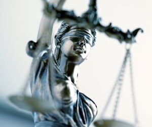 Former financial adviser charged with offences totaling over $1.8m